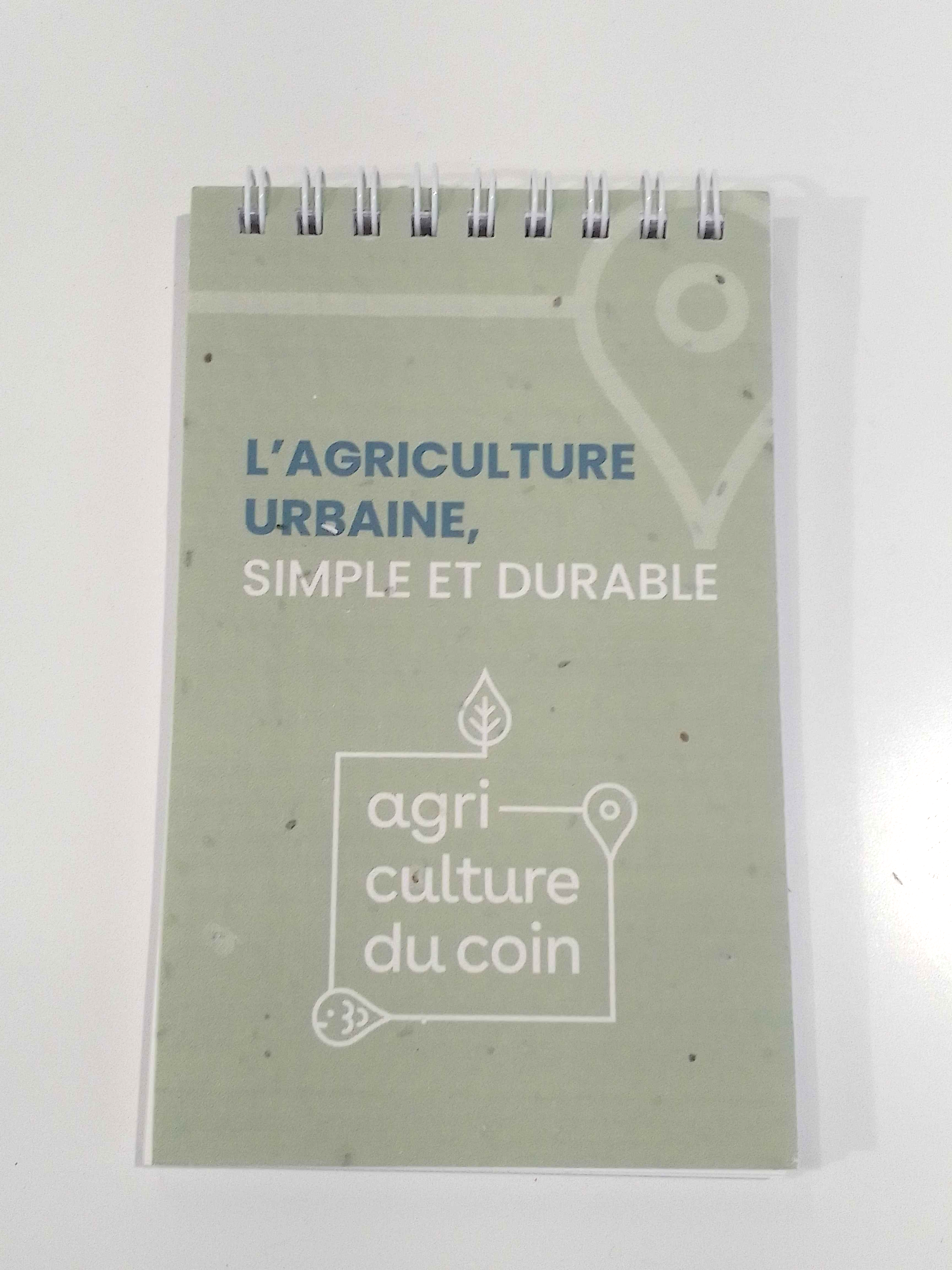 Petit cahier ensemencé avec notre logo